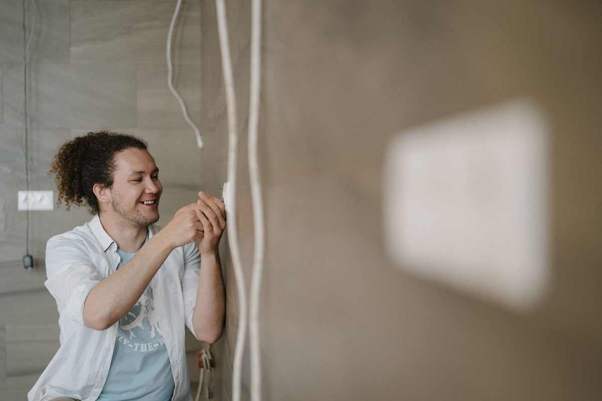 electrician working on an outlet